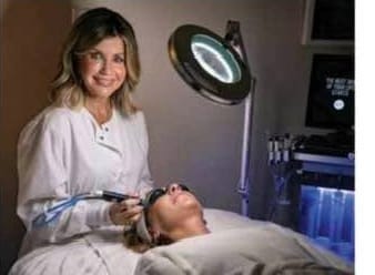Licensed esthetician Kim Amos performing a Hydrafacial at La Bella Donna Spa in Hickory